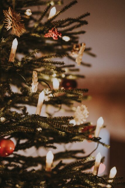 green Christmas tree wit ornaments