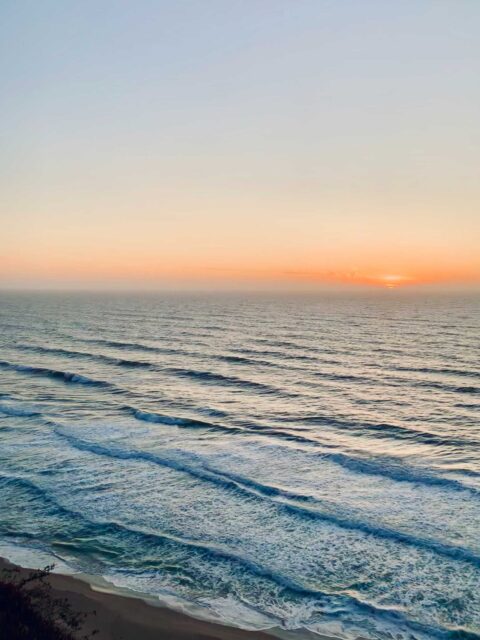 body of water during golden hour
