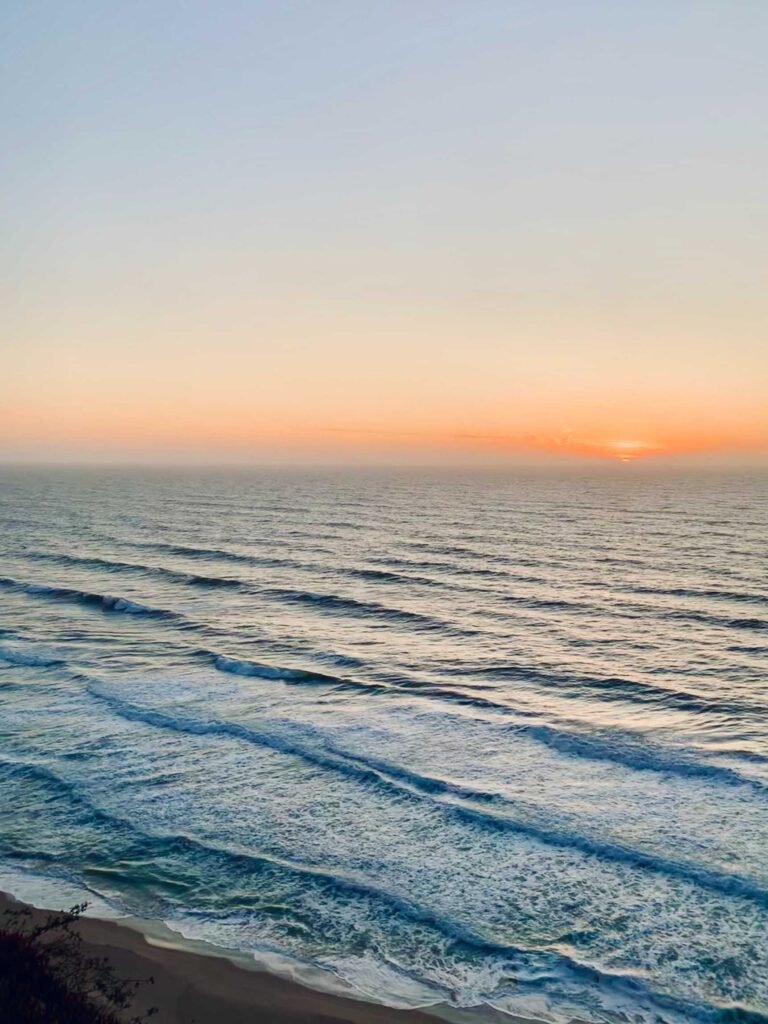 body of water during golden hour