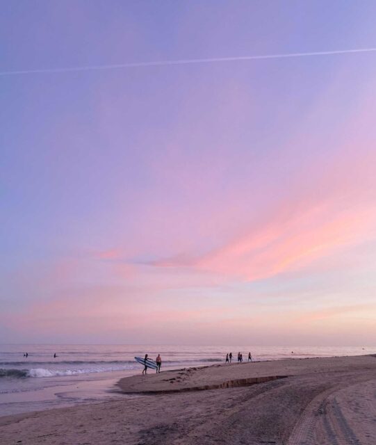 people walking on beach during daytime
