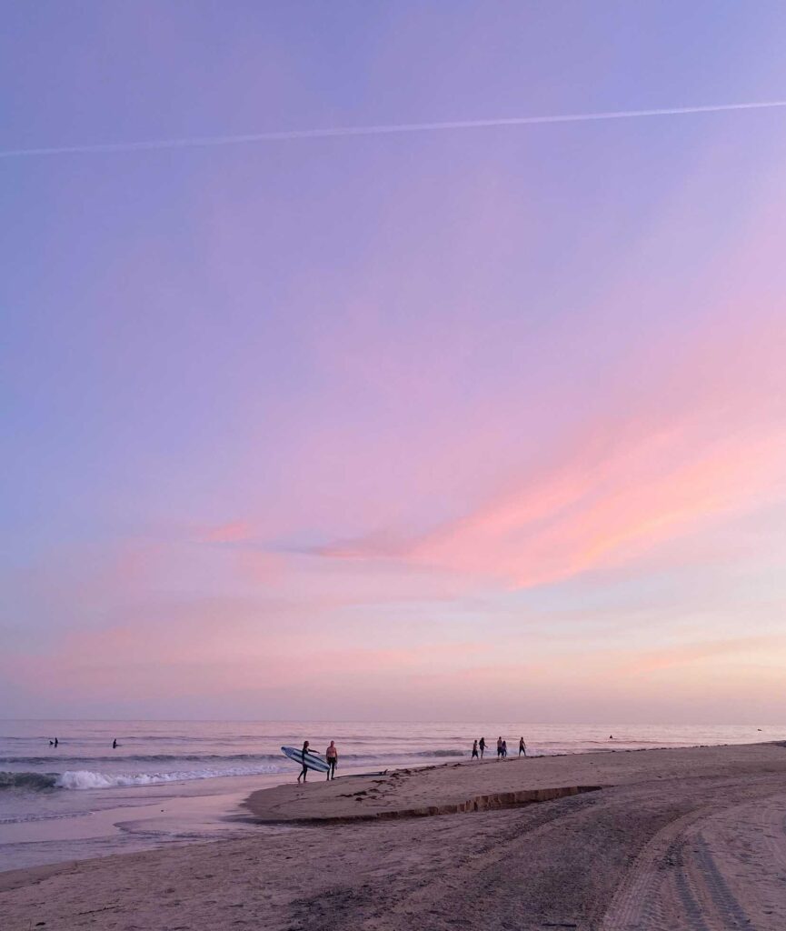 people walking on beach during daytime