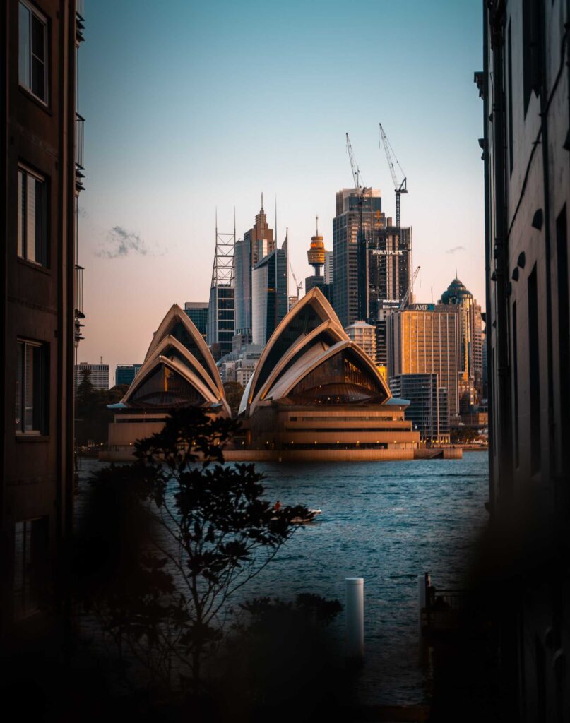 body of water between buildings during daytime