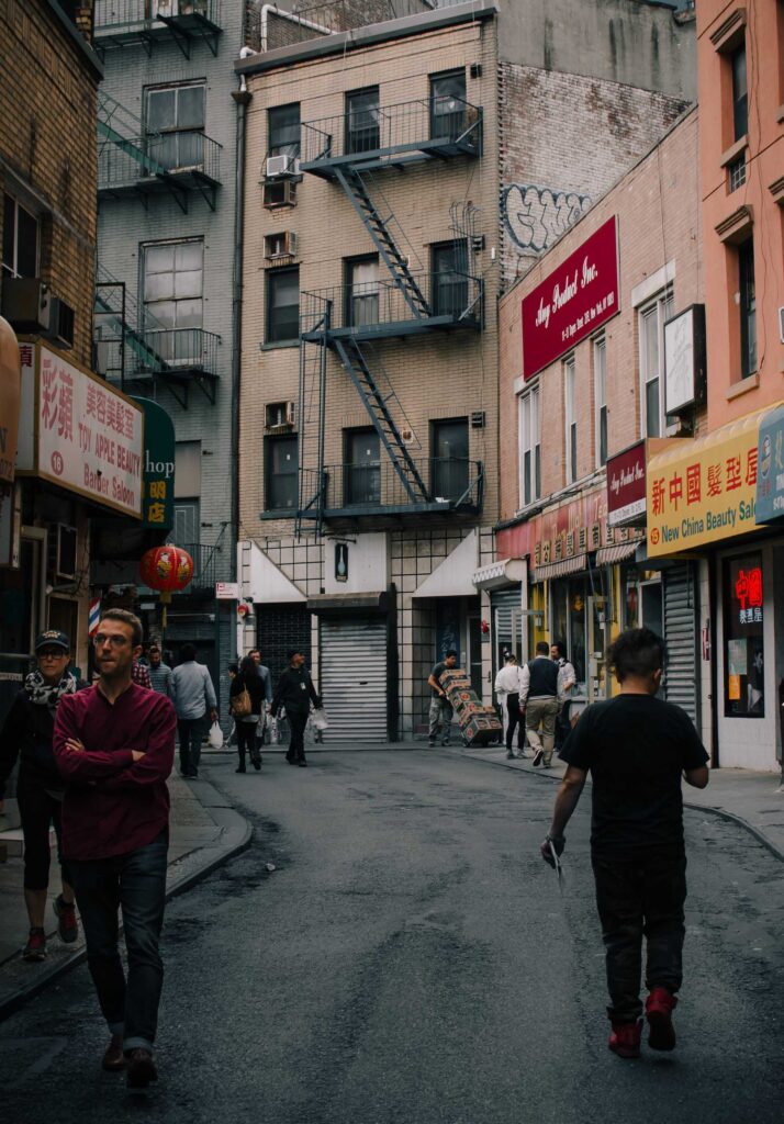 people walking down the street at China