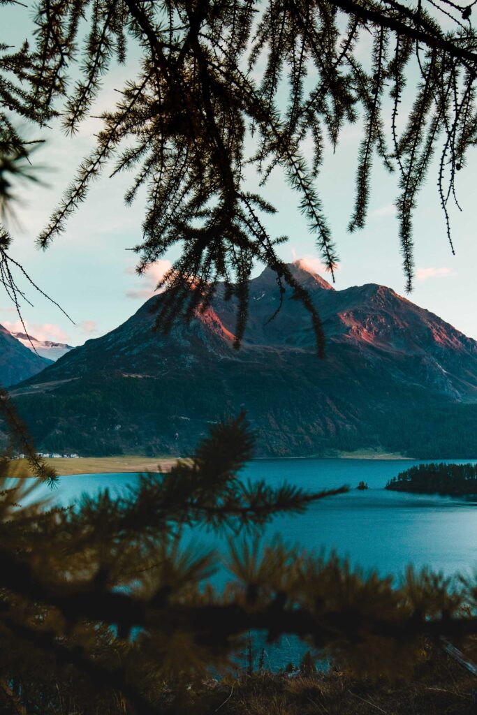 mountain beside body of water