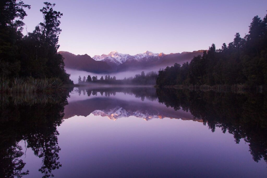 photo of lake near trees