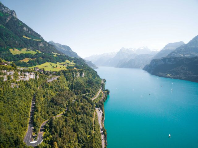bird’s eye photography of body of water near mountain