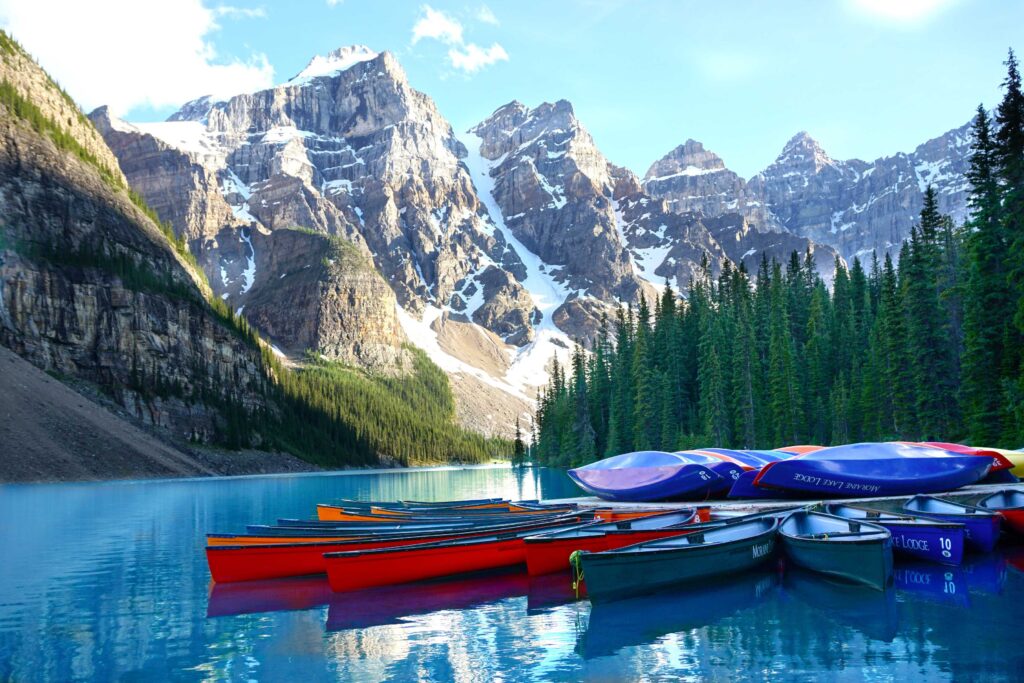 assorted-color boats on body of water