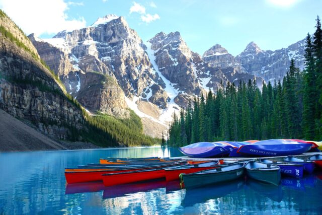 assorted-color boats on body of water