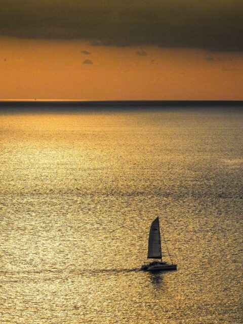 sailboat on body of water