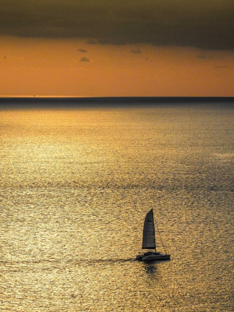 sailboat on body of water