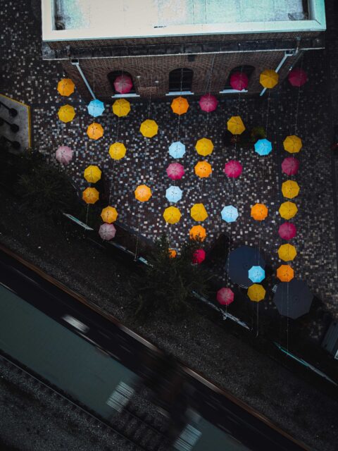 yellow and red balloons on street